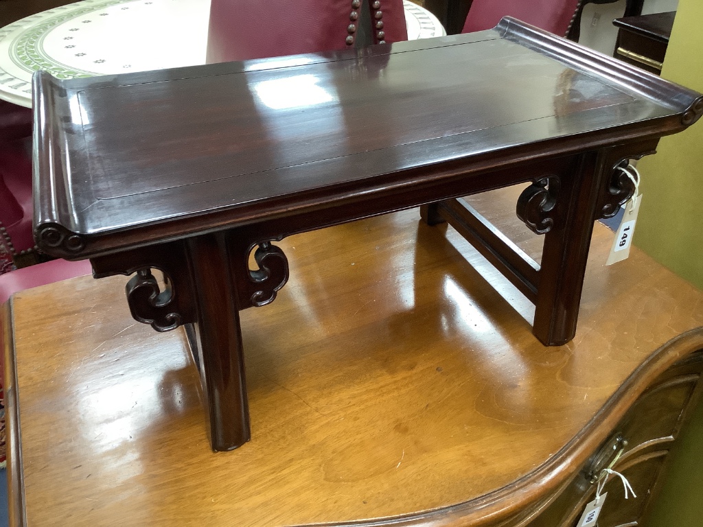 A Chinese small Hongmu low altar style table, width 56cm depth 30cm height 26cm